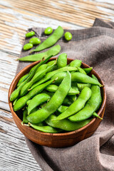 Boiled edamame Beans in a pan. White background. Top view