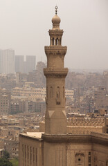 Fototapeta na wymiar Tall minaret El Sultan Hassan Mosque, Cairo