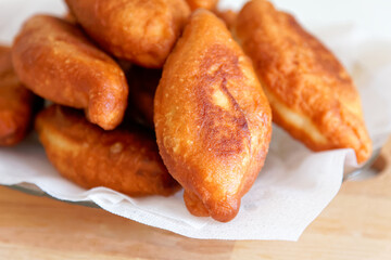 Close-up of deep-fried patties. Homemade bakery. on a wooden table