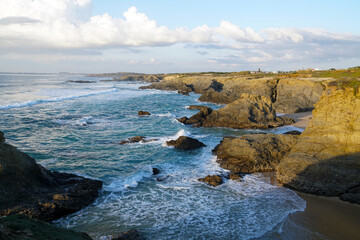 rocky cliff at typical beach at the west coast of Alentejo near Porto Covo