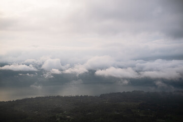 Obraz na płótnie Canvas Aerial view of clouds and lake in Indonesia