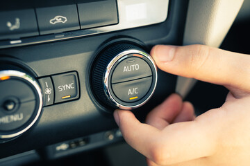 car air conditioner on off button close up view
