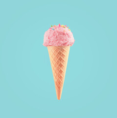 Ice cream cone close-up. Pink Icecream scoop in waffle cone over blue background. Strawberry or raspberry flavor Sweet dessert decorated with colorful sprinkles, closeup