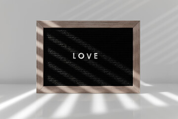 Love felt letter board in natural light