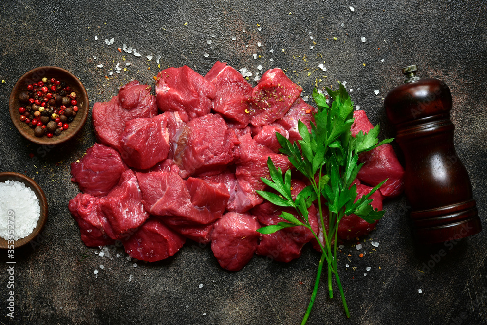 Wall mural raw organic meat ( beef or lamb ) . top view with copy space.