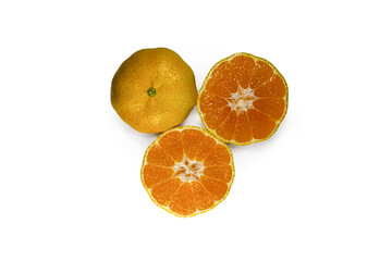 FRESH TANGERINES AND SLICES ON WHITE BACKGROUND 