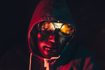 masked hacker man in glasses