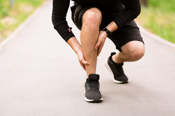 Fototapeta premium Calf sport muscle injury. Runner with pain in leg