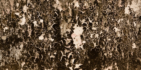 Grunge wall texture background. Paint cracking off dark wall