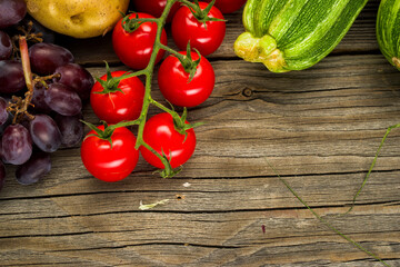 cherry tomatoes with fresh vegetables on the table, agricultural products from the market