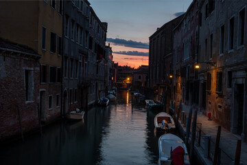 fascinating water canal at dusk in Venice Italy