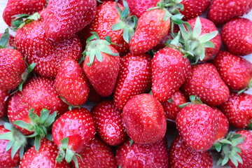 strawberry on top of a wooden table