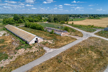 Abandoned and destroyed rural farm, aerial view