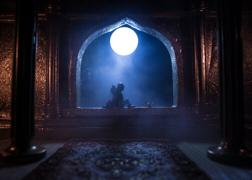 Beautiful arabian interior realistic miniature. Table decoration. Romantic couple at window.