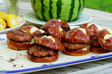 Grilled vegan burgers made with Beyond Meat plant-based protein