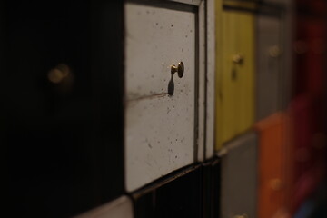 Wardrobe with multi-colored retractable boxes, manual work