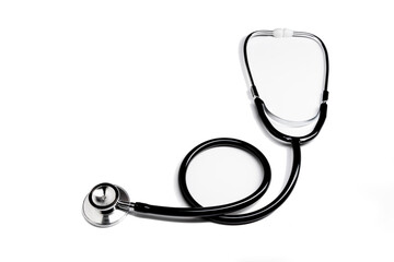 Isolated black stethoscope on a white background, slightly out of focus.