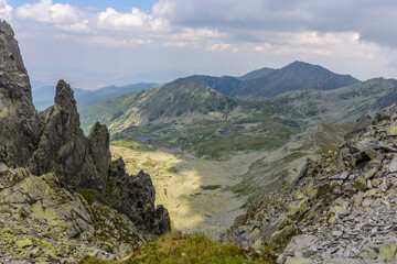 Panoramic view over steep and rocky mountain valley in Retezat National Park, Romania