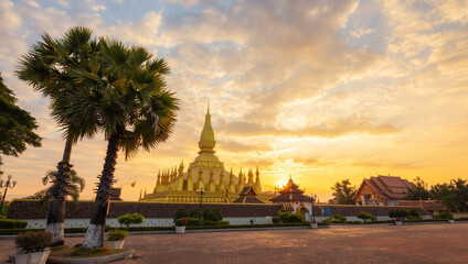 Pha That Luang Vientiane Golden Pagoda in Vientiane, Laos. sunset sky background beautiful.