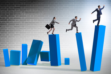 Business people in a collapsing economy concept