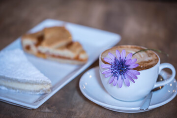 cup of coffee and a slice of a pie