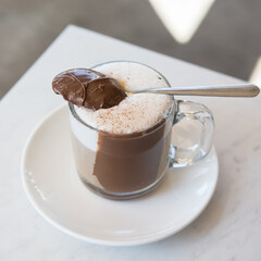 cup of cappuccino with nutella