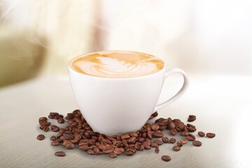 Flat white coffee and coffee beans