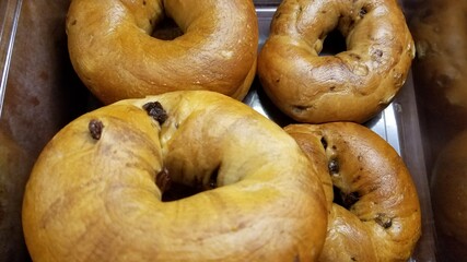 Close up of bagels for sale in bakery store