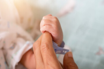 Small delicate little hand of newborn - close portrait