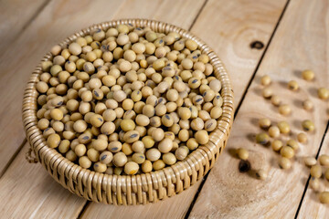 Soybeans in a wooden bowl on the table