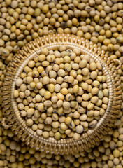 Soybeans in a wooden bowl on the table
