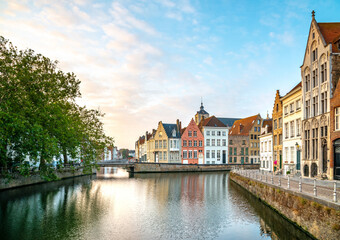 Fototapeta na wymiar Morning panoramic city view with nice town and canal in Bruges, Belgium