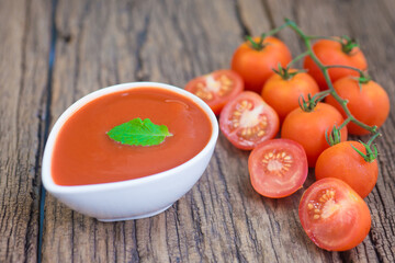 Ketchup  in a bowl with basil