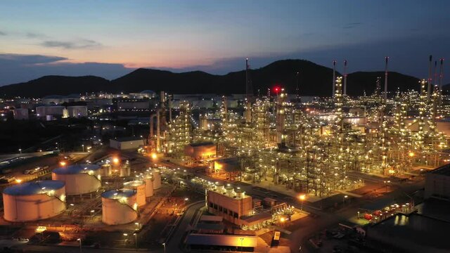 Aerial view footage B roll light oil terminal is industrial facility for storage of oil and petrochemical. oil manufacturing products. power electric plant. low light. Footage b roll drone shot 4k.