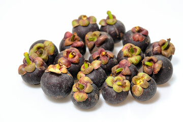Close-Up Of Mangosteen Fruits On Table