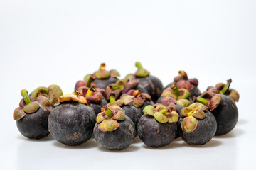 Close-Up Of Mangosteen Fruits On Table