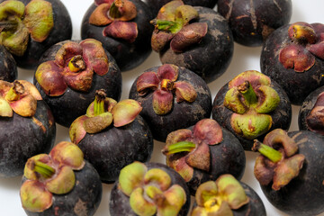 Close-Up Of Mangosteen Fruits On Table