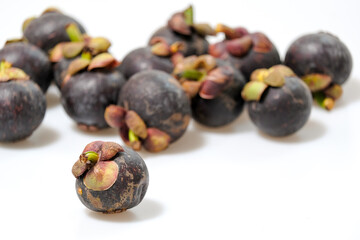 Close-Up Of Mangosteen Fruits On Table