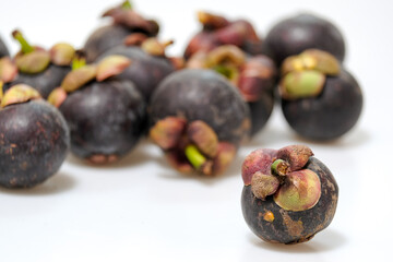 Close-Up Of Mangosteen Fruits On Table