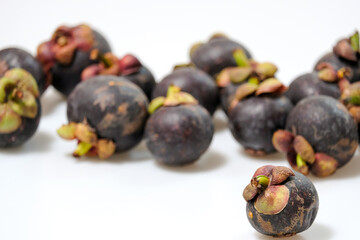 Close-Up Of Mangosteen Fruits On Table