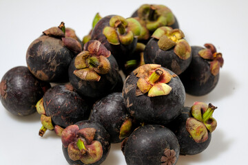 Close-Up Of Mangosteen Fruits On Table