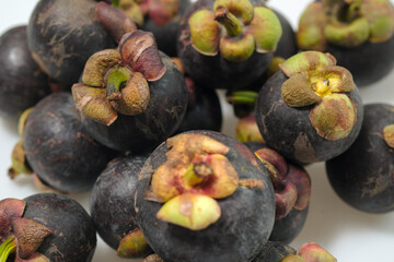 Close-Up Of Mangosteen Fruits On Table