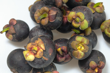 Close-Up Of Mangosteen Fruits On Table