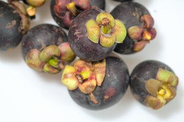 Close-Up Of Mangosteen Fruits On Table