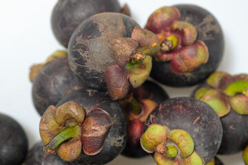 Close-Up Of Mangosteen Fruits On Table