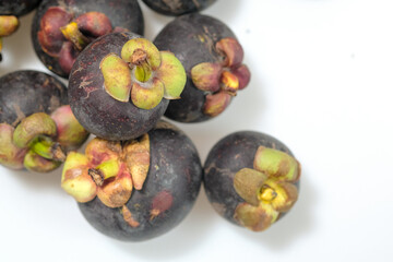 Close-Up Of Mangosteen Fruits On Table