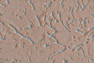 Background image of texture of the interior decoration of the wall with decorative stucco