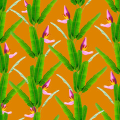 Seamless pattern with tropical leaves and banana flowers on an orange background