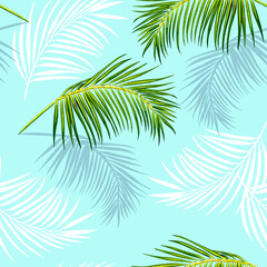 Fototapeta na wymiar Tropical palm print on a blue background. Palm leaves seamless pattern