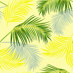 Fototapeta premium Fresh tropical print with coconut palm branches on yellow background, seamless pattern with palm trees.